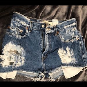 Levi’s 505 distressed jean shorts